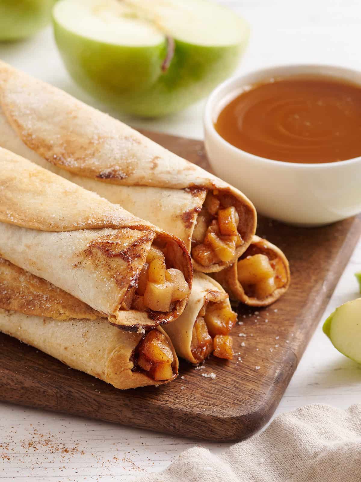 A stack of air fried apple flautas.