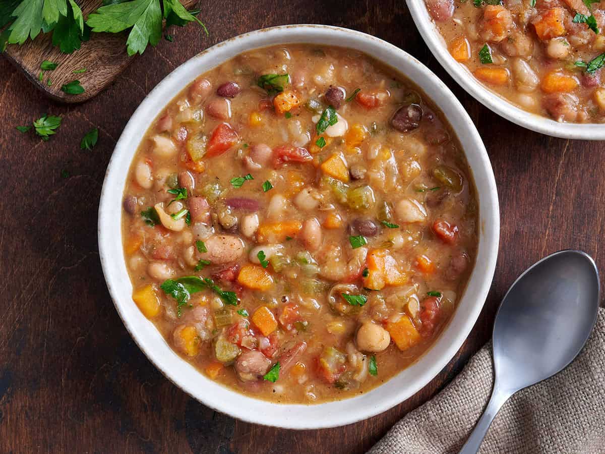 Overhead view of vegetarian 15 bean soup in a bowl.