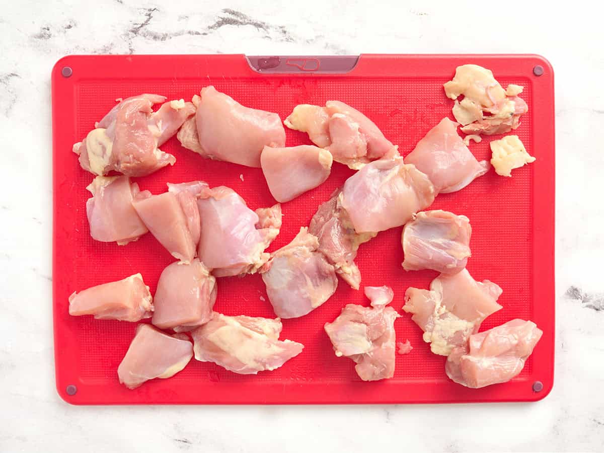 Diced chicken thigh pieces.