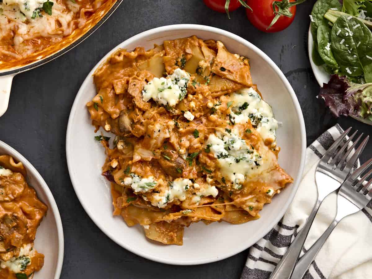 Overhead view of a plate of mushroom alla vodka sauce stove top lasagna.