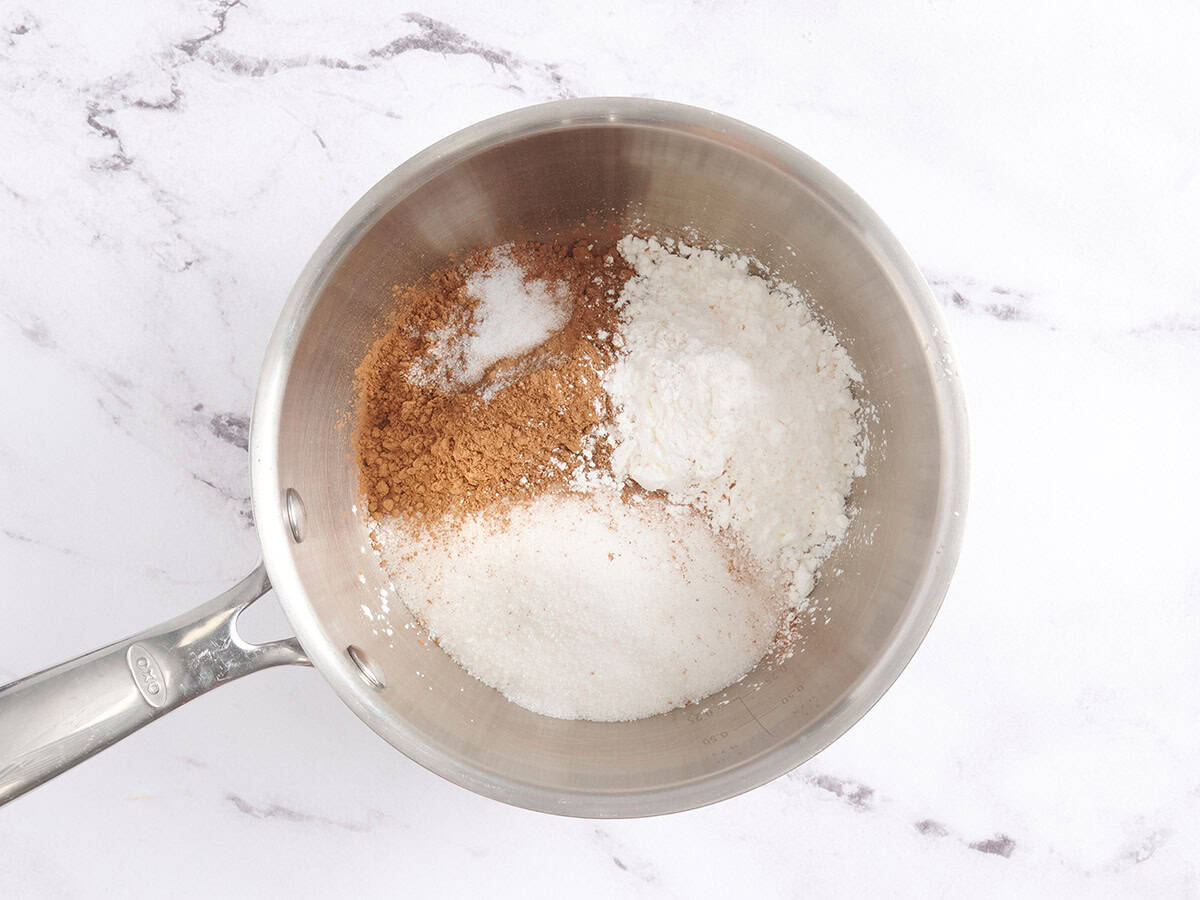 Sugar, cocoa powder, cornstarch and salt in a sauce pan.