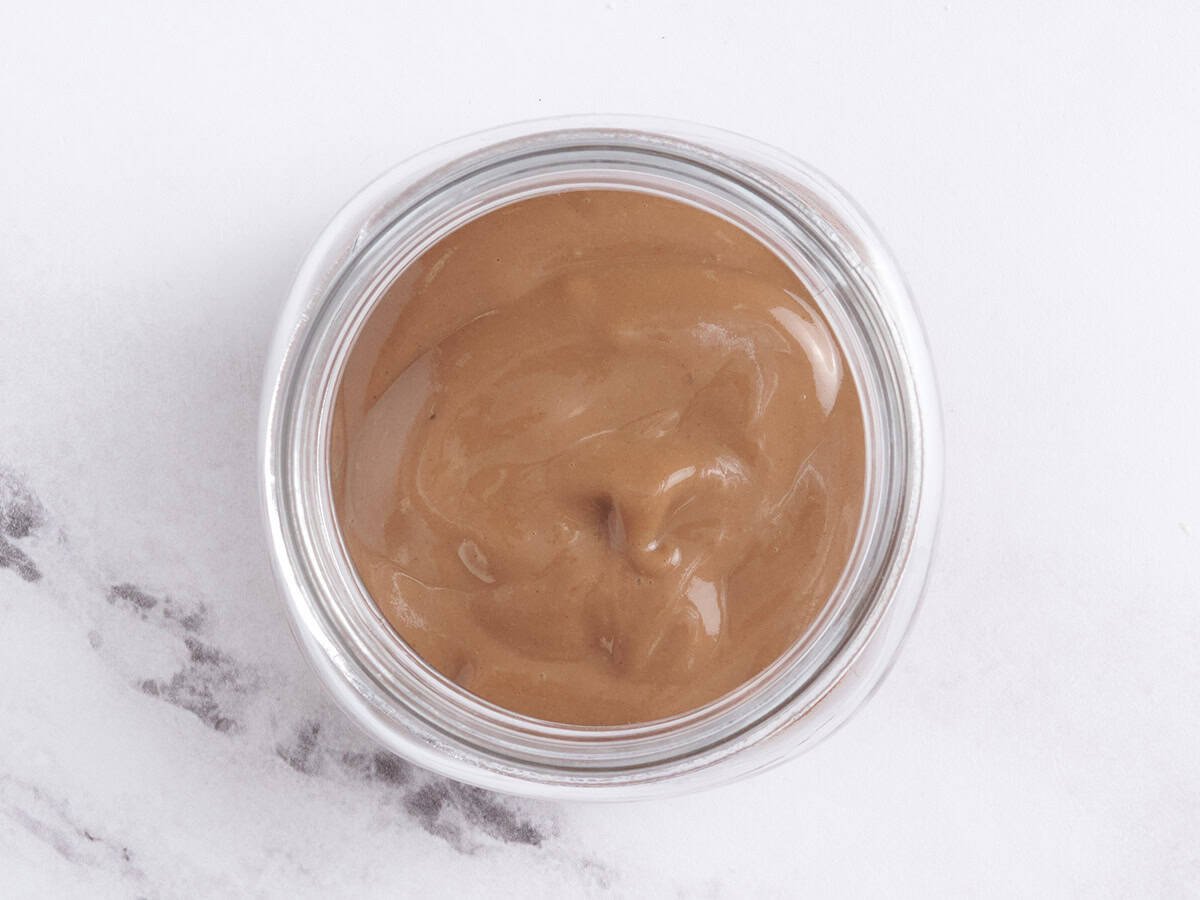 Chocolate pudding in a mason jar.