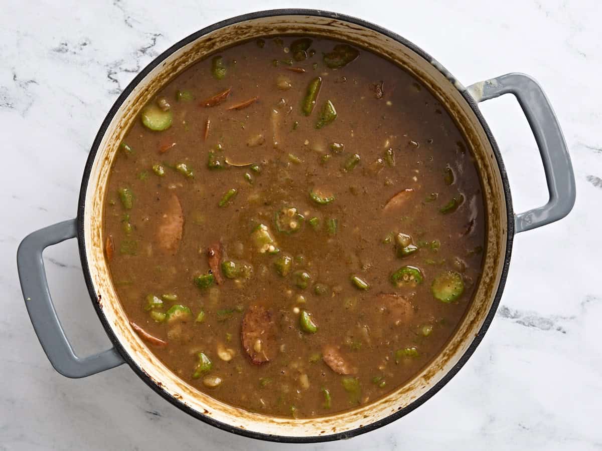 Homemade gumbo in a pot before simmering.