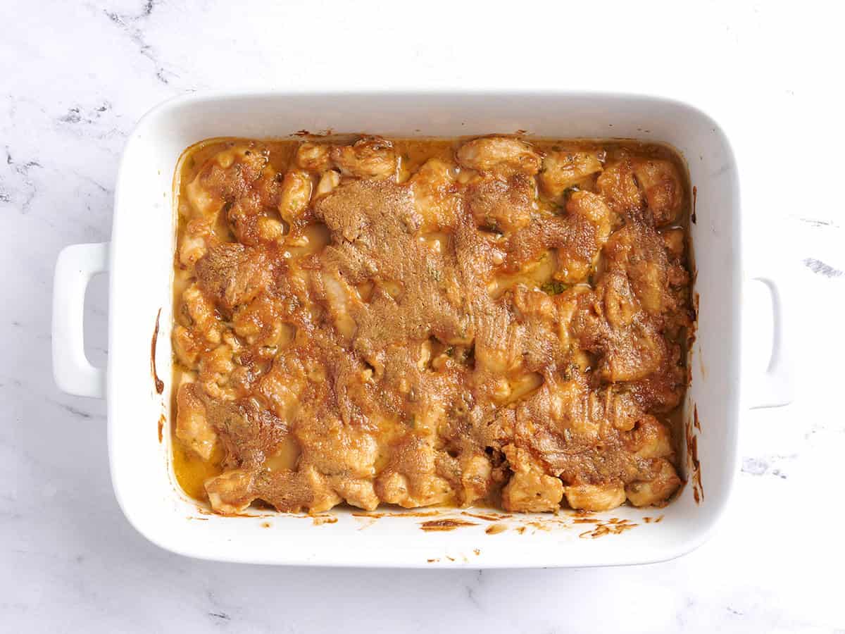 Thai peanut chicken after baking in a baking dish.