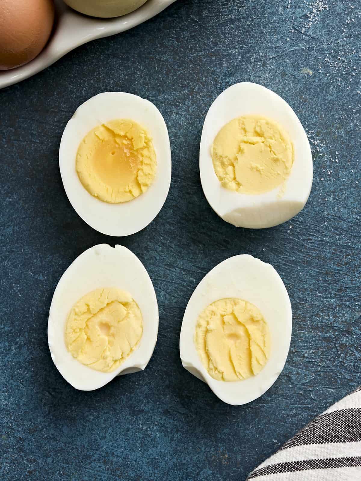 Overhead view of air fryer hard boiled eggs.