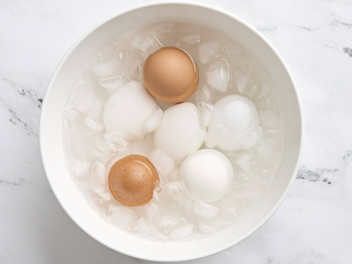 Air fryer hard boiled eggs in an ice bath.