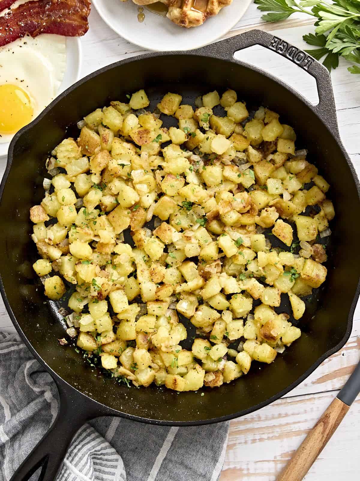 Overhead view of skillet breakfast potatoes.