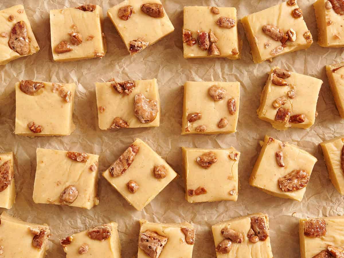 Overhead view of pumpkin spiced fudge on parchment paper.
