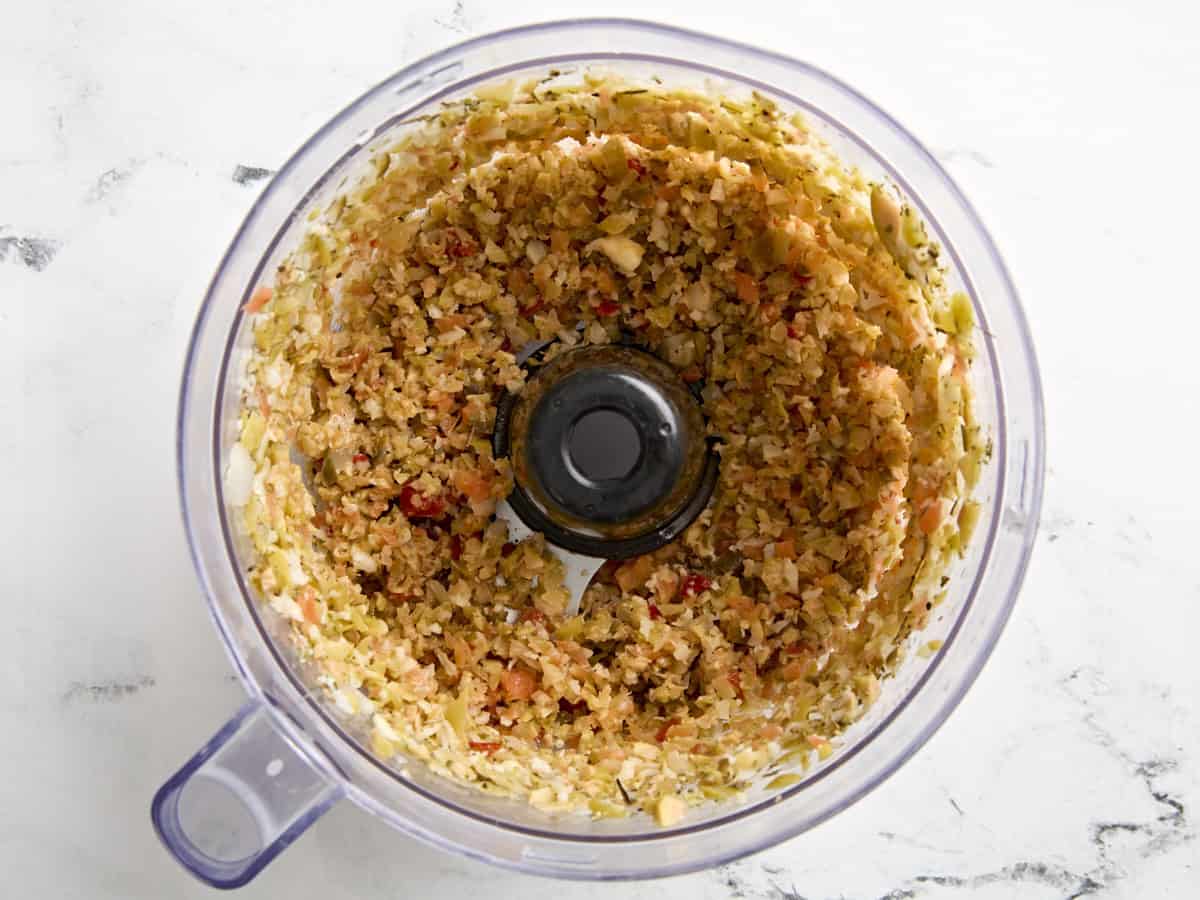 Pulsed muffaletta salad ingredients in a food processor