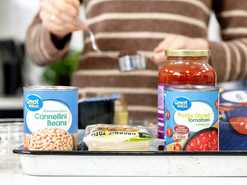 pantry ingredients being used to make a budget friendly recipe