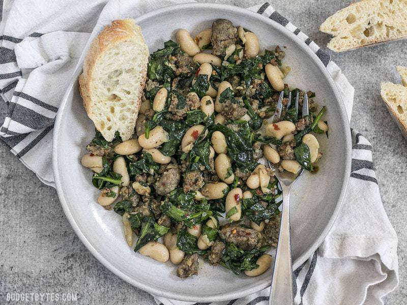 It doesn't get easier than this high protein, high fiber, high FLAVOR Italian Sausage and White Bean Skillet! BudgetBytes.com