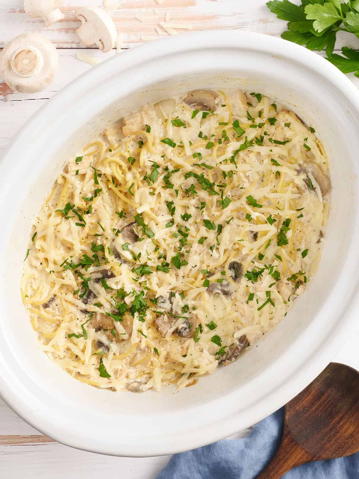 Overhead view of crockpot chicken tetrazzini in a slow cooker.