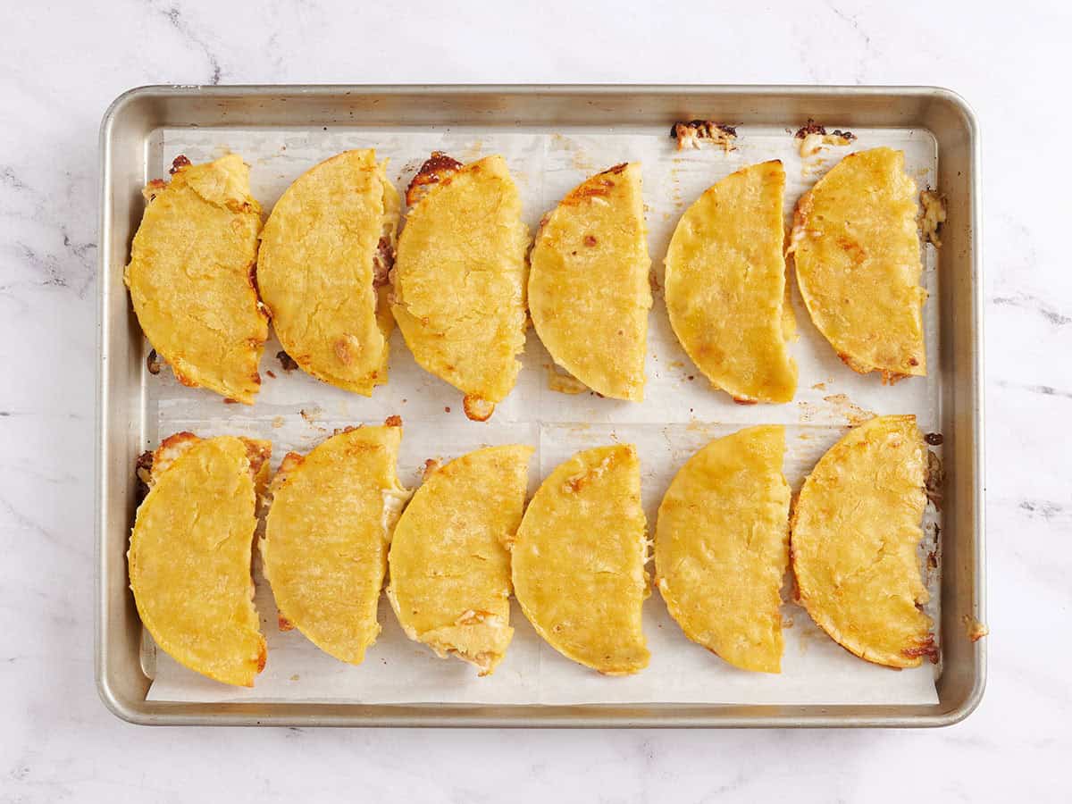 Sheet pan tacos halfway through baking.