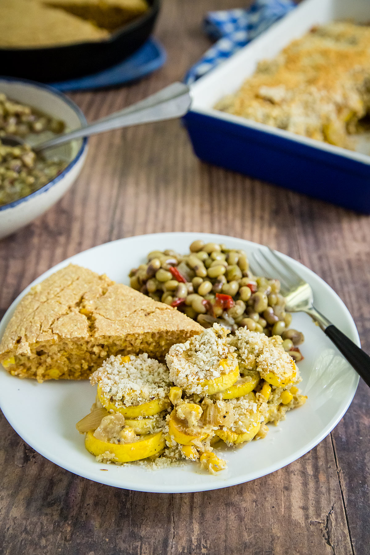 Squash and Corn Casserole with vegan cornbread and field peas