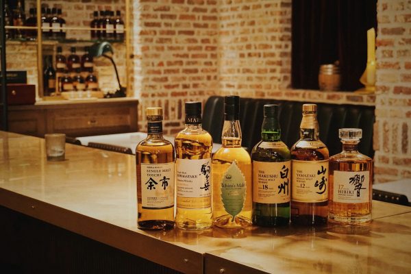 bottles of Japanese whisky on a counter